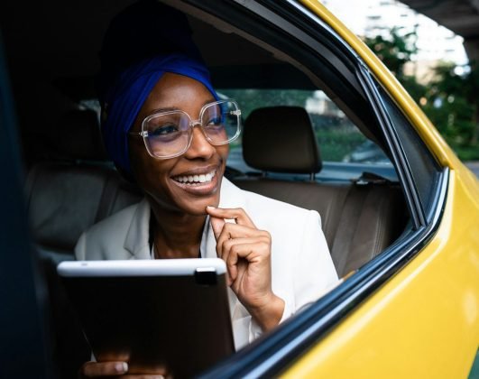 beautiful-business-women-driving-at-the-airport-leaving-on-for-a-working-travel.jpg