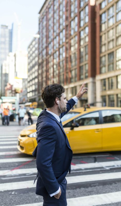 businessman-in-the-streets-of-manhattan-hailing-a-cab.jpg businessman-in-the-streets-of-manhattan-hailing-a-cab.jpg